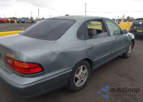 1999 Toyota Avalon Xls z USA, uszkodzony, nr VIN 4T1BF18B9XU299912